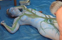 Nude body painters in action 26