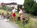 2 nude girls on bicycle and with dog 66