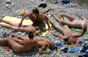 nudists group on beach nc11